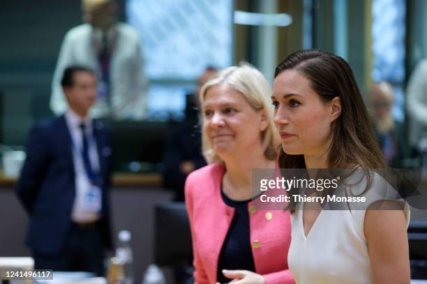 Swedish Prime Minister Eva Magdalena Andersson and the Finish Prime Minister Sanna Mirella Marin arrive for the second day of an EU summit in the...
