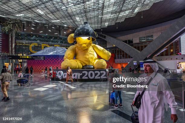 Travelers inside the departures terminal at Hamad International Airport in Doha, Qatar, on Thursday, June 23, 2022. About 1.5 million fans, a little...