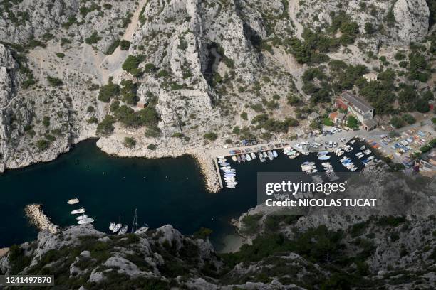 Photograph taken on June 24, 2022 shows the calanque de Morgiou from above in the Parc National des Calanques in Marseille, southern France, on June...