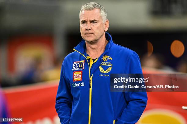 Adam Simpson, Senior Coach of the Eagles addresses their players at three quarter time during the 2022 AFL Round 15 match between the West Coast...