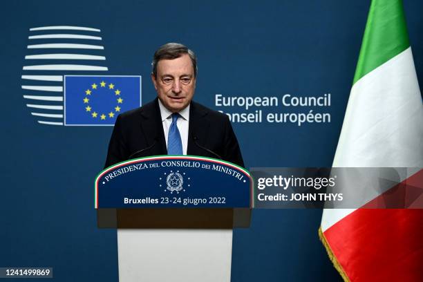 Italy's Prime Minister Mario Draghi holds a press conference at the end of an European Union leaders summit in Brussels on June 24, 2022.