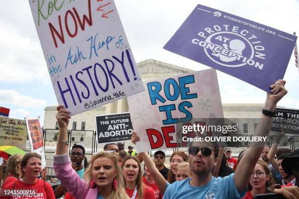 Pro-life supporters celebrate outside the US Supreme Court in Washington, DC, on June 24, 2022. The US Supreme Court on Friday ended the right to...