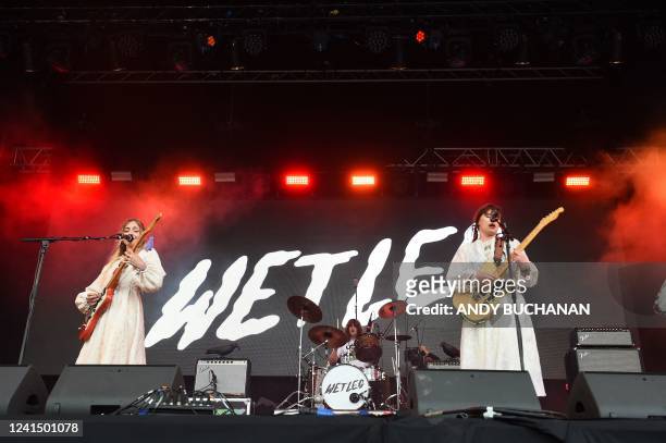 Rhian Teasdale and Hester Chambers of British band Wet Leg perform on stage at the Glastonbury festival near the village of Pilton in Somerset,...