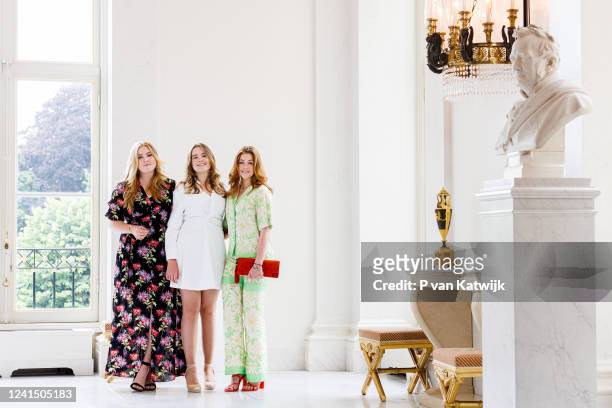 Princess Amalia of The Netherlands, Princess Alexia of The Netherlands and Princess Ariane of The Netherlands during a photosession in Palace...