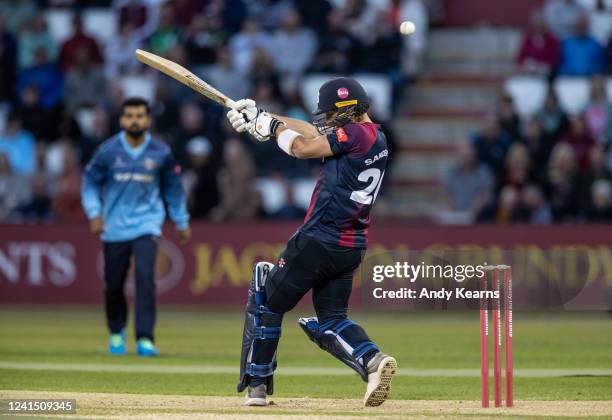 Ben Sanderson of Northamptonshire Steelbacks plays at a high delivery during the Vitality T20 Blast match between Northamptonshire Steelbacks and...