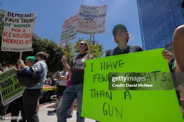 Protesters gather outside the First Street United States Courthouse to denounce the Supreme Court's decision in the Dobbs v Jackson Women's Health...