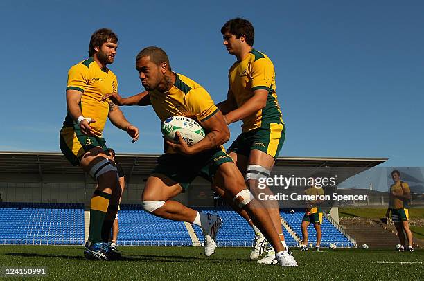 Digby Ioane of the Wallabies runs the ball during an Australia IRB Rugby World Cup 2011 training session at The Trusts Stadium on September 9, 2011...