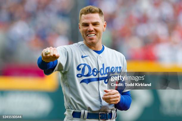 Freddie Freeman of the Los Angeles Dodgers receives his World Series Ring from his 2021 season with the Atlanta Braves prior to the game between the...