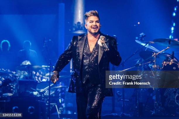 Singer Adam Lambert performs live on stage during a concert with the British band Queen at the Mercedes-Benz Arena on June 24, 2022 in Berlin,...