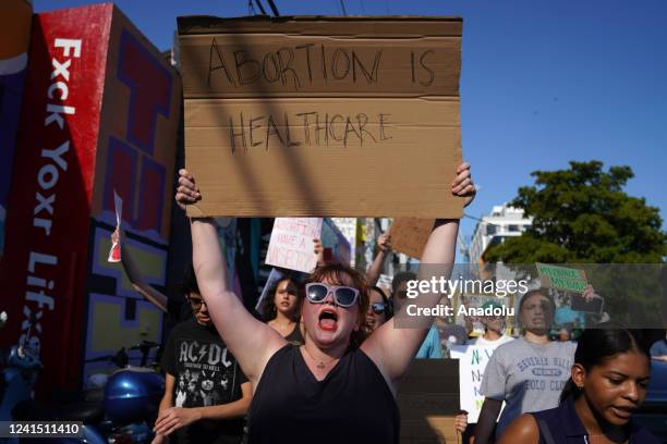 People march together to protest the Supreme Court's decision in the Dobbs v Jackson Women's Health case on June 24, 2022 in Miami, Florida. The...