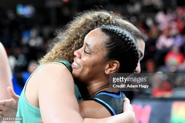 Durr of the Atlanta Dream hugs Lorela Cubaj of the New York Liberty after the game on June 24, 2022 at Gateway Center Arena in College Park, Georgia....