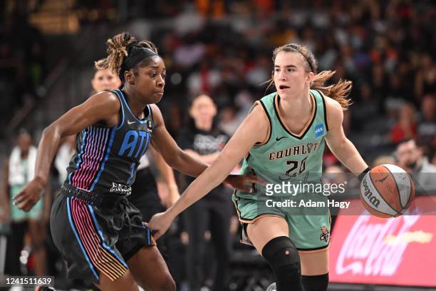Sabrina Ionescu of the New York Liberty dribbles the ball during the game against the Atlanta Dream on June 24, 2022 at Gateway Center Arena in...