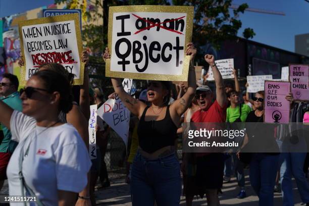 People march together to protest the Supreme Court's decision in the Dobbs v Jackson Women's Health case on June 24, 2022 in Miami, Florida. The...