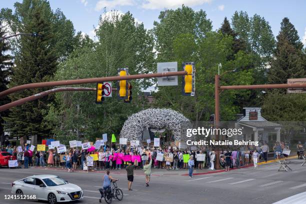 Abortion rights protesters chant slogans during a gathering to protest the Supreme Court's decision in the Dobbs v Jackson Women's Health case on...