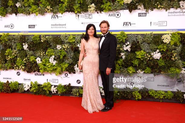 German actress and director Jasmin Tabatabai and her partner German actor Andreas Pietschmann arrive for the 72nd Lola - German Film Award at Palais...