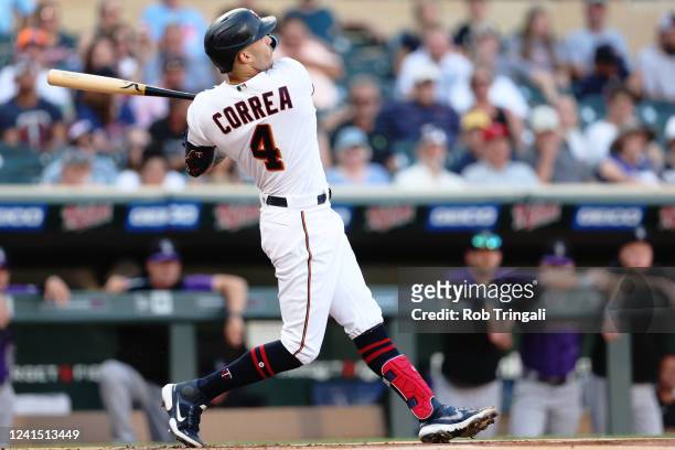 Carlos Correa of the Minnesota Twins bats in the first inning during the game between the Colorado Rockies and the Minnesota Twins at Target Field on...