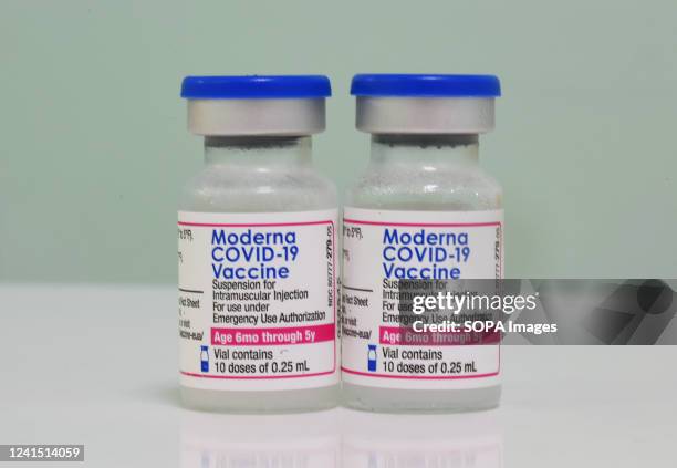 Blue-capped vials of the two-dose Moderna Covid-19 vaccine for children between 6 months and five years are seen at Nona Pediatric Center in Orlando....