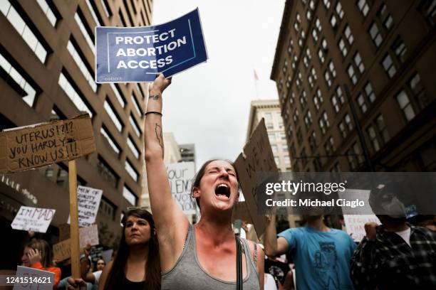 Ashley Davis participates in a protest against the Supreme Court's decision to overturn Roe v. Wade on June 24, 2022 in Denver, Colorado. The Court's...