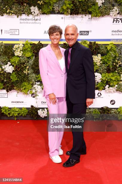 Gisi Herbst and her husband German actor Christoph Maria Herbst arrive for the 72nd Lola - German Film Award at Palais am Funkturm on June 24, 2022...