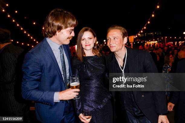 Friedrich Muecke, Jennifer Ulrich and Matthias Schweighoefer during the 72nd Lola - German Film Award party at Palais am Funkturm on June 24, 2022 in...