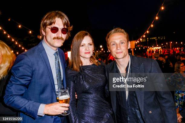 Friedrich Muecke, Jennifer Ulrich and Matthias Schweighoefer during the 72nd Lola - German Film Award party at Palais am Funkturm on June 24, 2022 in...