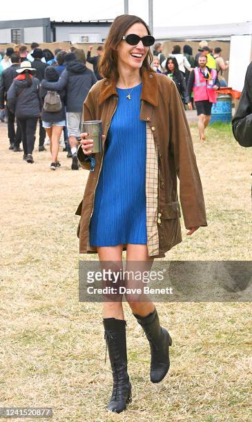 Alexa Chung is seen on day one of the festival wearing her vintage Barbour jacket on June 24, 2022 in Glastonbury, England.