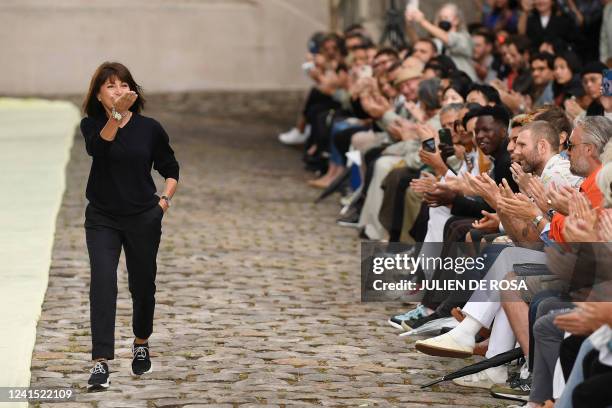 French designer Veronique Nichanian acknowledges the audience at the end of the Hermes Menswear Spring Summer 2023 show as part of Paris Fashion...