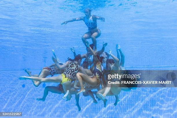 Switzerland's team compete in the women's team highlight artistic swimming finals during the Budapest 2022 World Aquatics Championships at the Alfred...