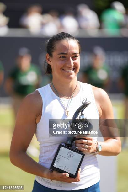 June 2022, Hessen, Bad Homburg: Tennis: WTA Tour, competition, final singles, women, Andreescu - Garcia . Tournament winner Caroline Garcia with the...