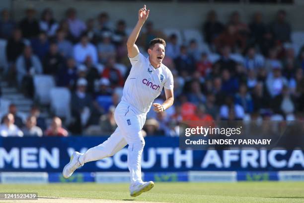 England's Matthew Potts celebrates after taking the wicket of New Zealand's captain Kane Williamson for 48 on day 3 of the third cricket Test match...