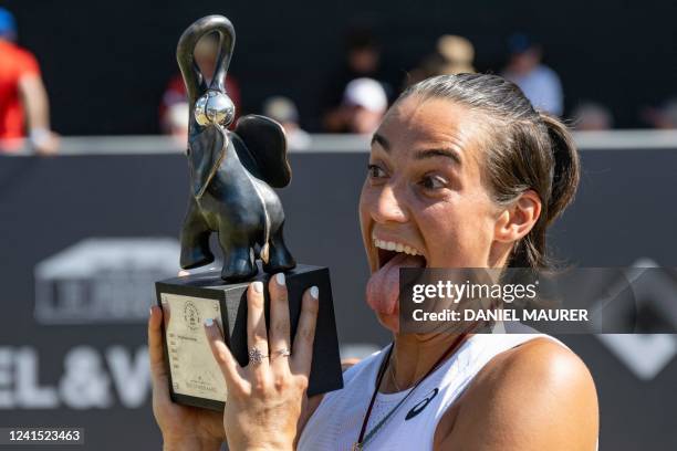 France's Caroline Garcia celebrates with the trophy after winning the 2022 WTA Bad Homburg Open tennis final match against Canada's Bianca Andreescu...