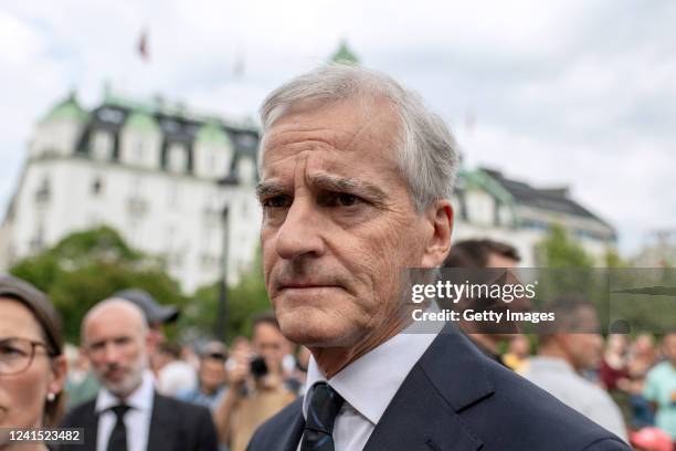 The Norwegian Prime Minister Jonas Gahr Støre addresses the press after visiting a makeshift memorial near the restaurant where Two people were...