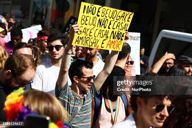 People attend the Marcha Do Orgulho LGBTI+ 2022 in Porto, Portugal on June 25, 2022.