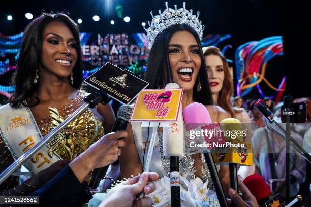 Winner Miss Philippines Fuschia Anne Ravena is flanked by first runner-up 'Miss Colombia' Jasmine Jimenez and second runner-up 'Miss France' Aela...