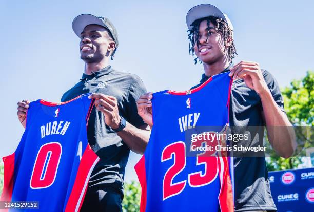 Detroit Pistons draft picks Jalen Duren and Jaden Ivey holds new jerseys during the Detroit Pistons Draft Press Conference at Rouge Park on June 24,...