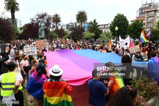 People attend the Marcha Do Orgulho LGBTI+ 2022 in Porto, Portugal on June 25, 2022.