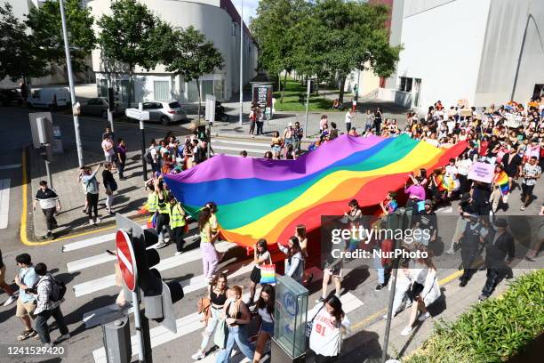 People attend the Marcha Do Orgulho LGBTI+ 2022 in Porto, Portugal on June 25, 2022.