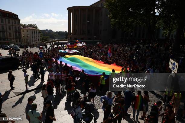 People attend the Marcha Do Orgulho LGBTI+ 2022 in Porto, Portugal on June 25, 2022.