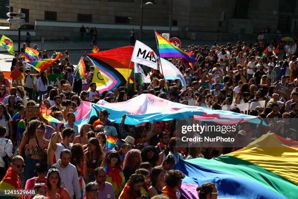 People attend the Marcha Do Orgulho LGBTI+ 2022 in Porto, Portugal on June 25, 2022.