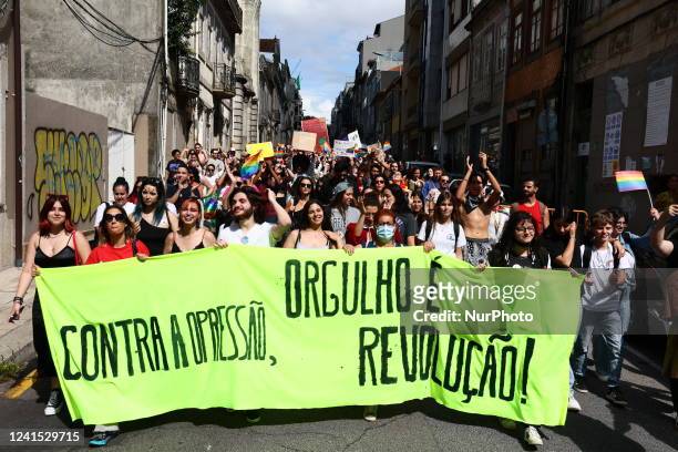 People attend the Marcha Do Orgulho LGBTI+ 2022 in Porto, Portugal on June 25, 2022.