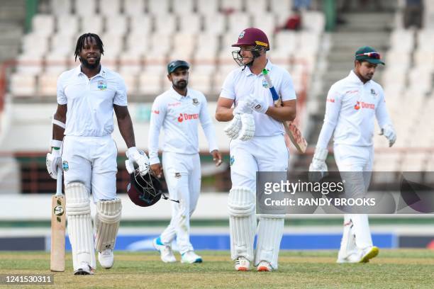 Kyle Mayers and Joshua Da Silva , of West Indies, walk off the field at the end of the second day of the 2nd Test between Bangladesh and West Indies...