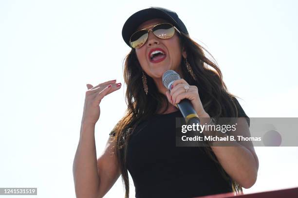 Rep. Lauren Boebert gives remarks during a Save America Rally with former US President Donald Trump at the Adams County Fairgrounds on June 25, 2022...