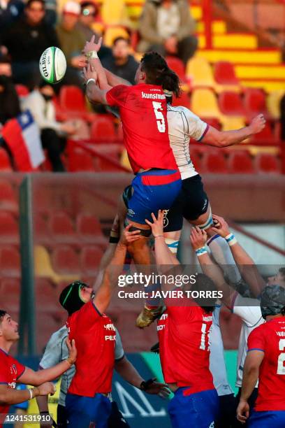 Chile's Clemente Saavedra struggles for the ball during the rugby union international friendly match against Scotland A, at the Santa Laura stadium,...