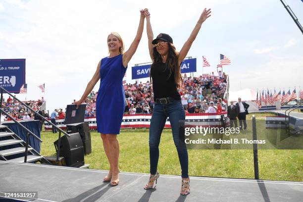 Representative Mary Miller cheers with Rep. Lauren Boebert during a Save America Rally with former US President Donald Trump at the Adams County...