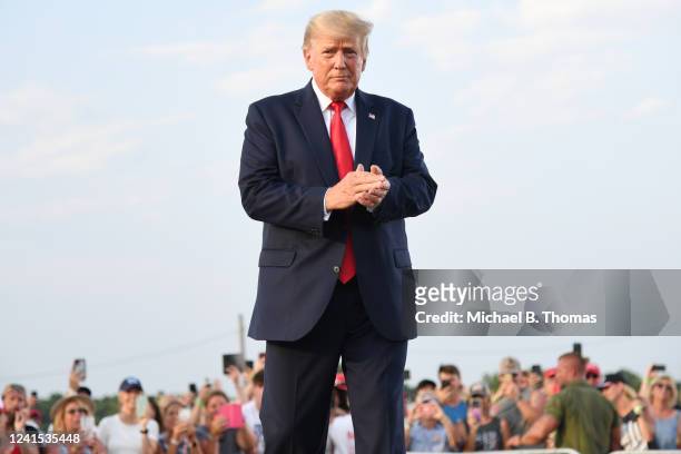 Donald Trump arrives to give remarks during a Save America Rally with former US President Donald Trump at the Adams County Fairgrounds on June 25,...
