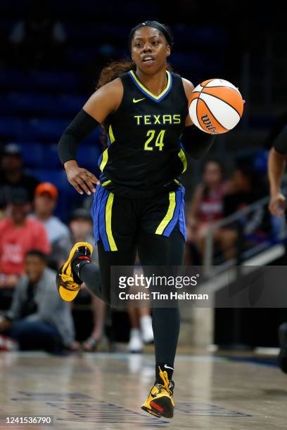Arike Ogunbowale of the Dallas Wings dribbles the ball during the game against the Phoenix Mercuryon June 25, 2022 at the College Park Center in...