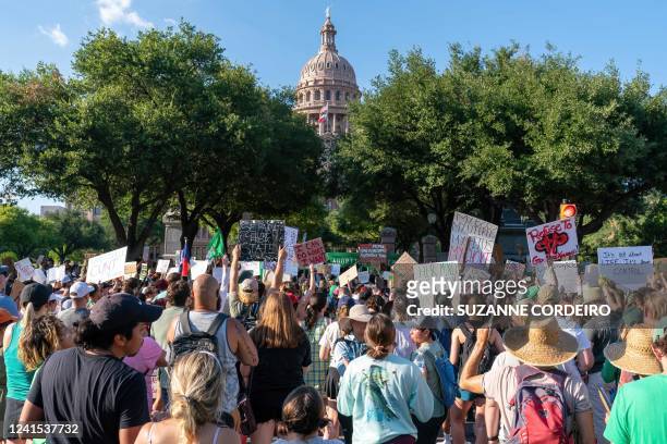 Abortion rights demonstrators gather near the State Capitol in Austin, Texas, June 25, 2022. - Abortion rights defenders fanned out across America on...