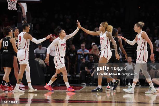 The Washington Mystics celebrate during the game against the Las Vegas Aces on June 25, 2022 at Michelob ULTRA Arena in Las Vegas, Nevada. NOTE TO...