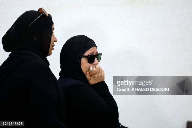 The mother of murdered university of Mansoura student Naira Ashraf, reacts as she attends the first trial session of the presumed murderer Mohamed...