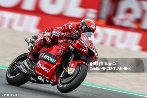 Ducati's Italian rider Francesco Bagnaia rides during the Dutch MotoGP at the TT circuit of Assen on June 26, 2022. - Italy's Francesco Bagnaia won...